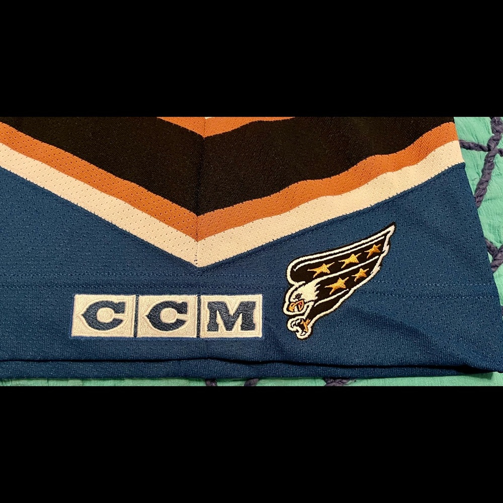 Authentic blue CCM Washington Capitals Screaming Eagle Hockey Jersey.